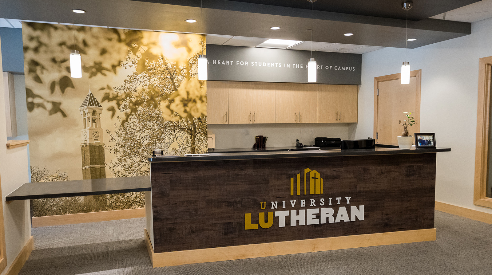 Full Environmental Design by Creativeinc. for University Lutheran Church in West Lafayette, IN. Custom Signage, Interior Signage, Exterior Signage, Wayfinding Signage, ADA Compliant Signage, Wall Wrap, Wall Graphics, Cut Vinyl Graphics, Elevator Graphics, 3D Signage, Frosted Vinyl, Design Services, Installation.